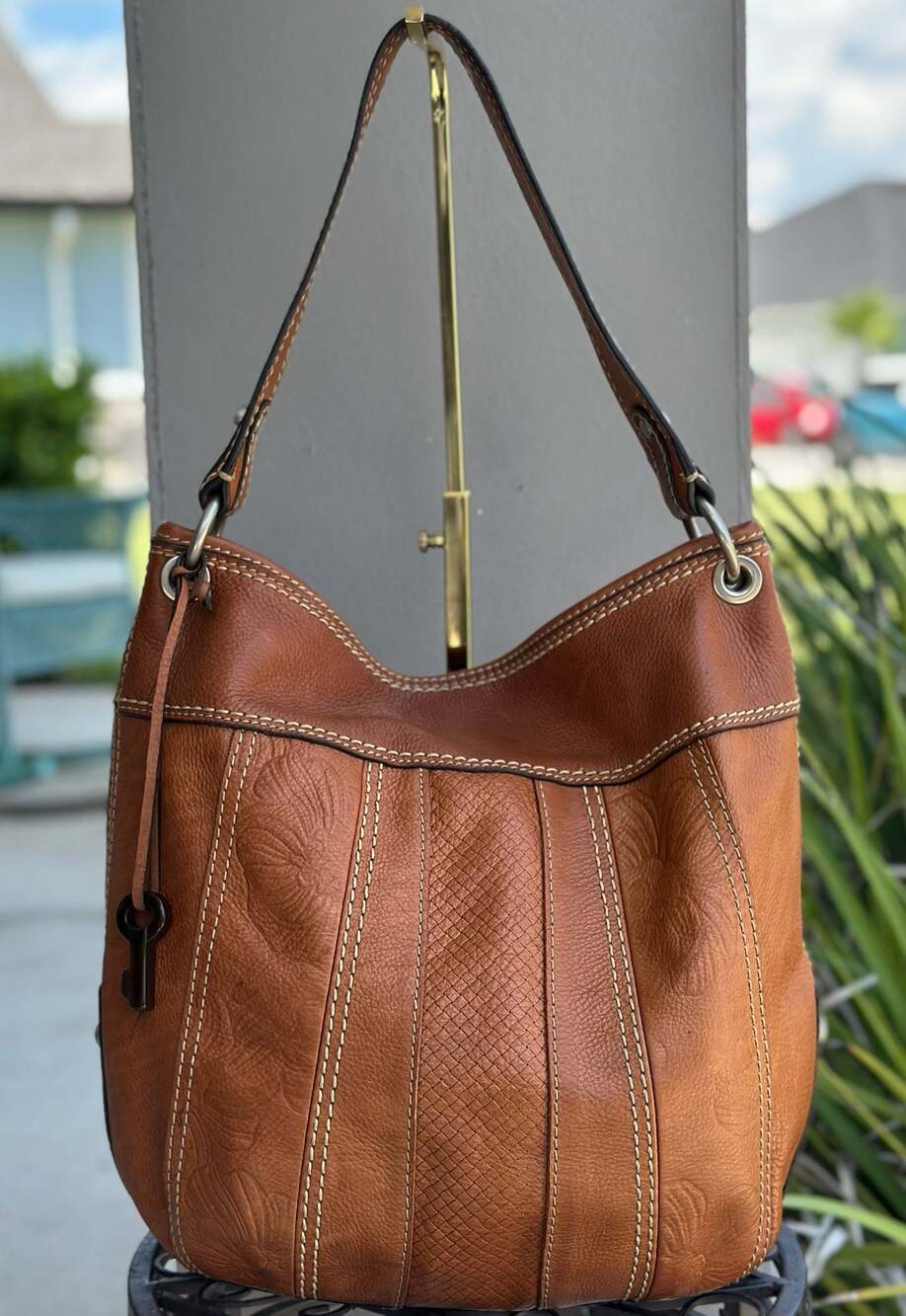 Fossil Brown Leather Hobo Shoulder Bag with Embossed Floral and Textured Details